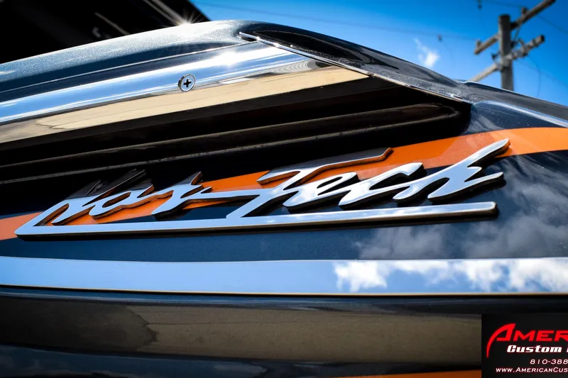 Slide: The Image of 2027 Nor-Tech 450 Sport Center Console boat logo with sleek design and vibrant colors. - 12