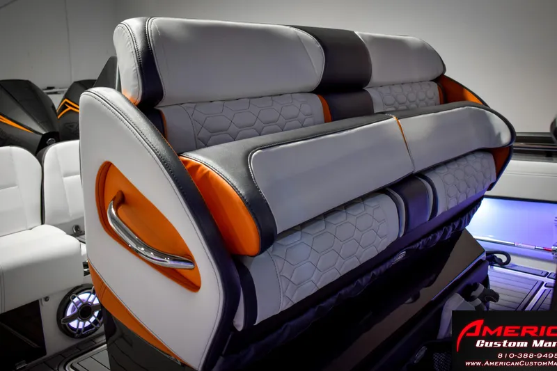 Slide: The Image of Luxurious seating on 2027 Nor-Tech 450 Sport Center Console with modern design and vibrant accents. - 17