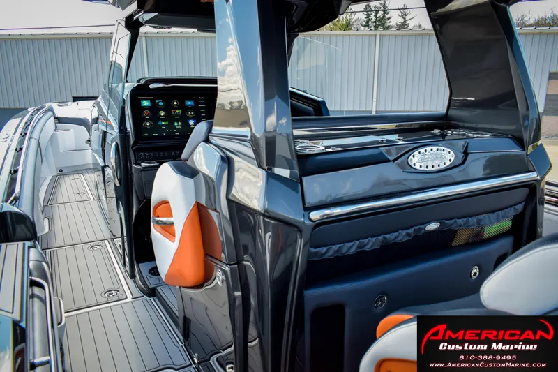 Slide: The Image of 2027 Nor-Tech 450 Sport Center Console with sleek design and advanced dashboard technology. - 9