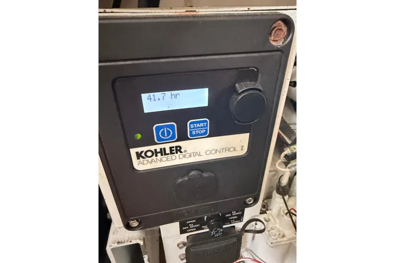 Slide: The Image of Kohler Advanced Digital Control panel on 2010 Sea Ray 370 Express Cruiser, showing 41.7 hours. - 16