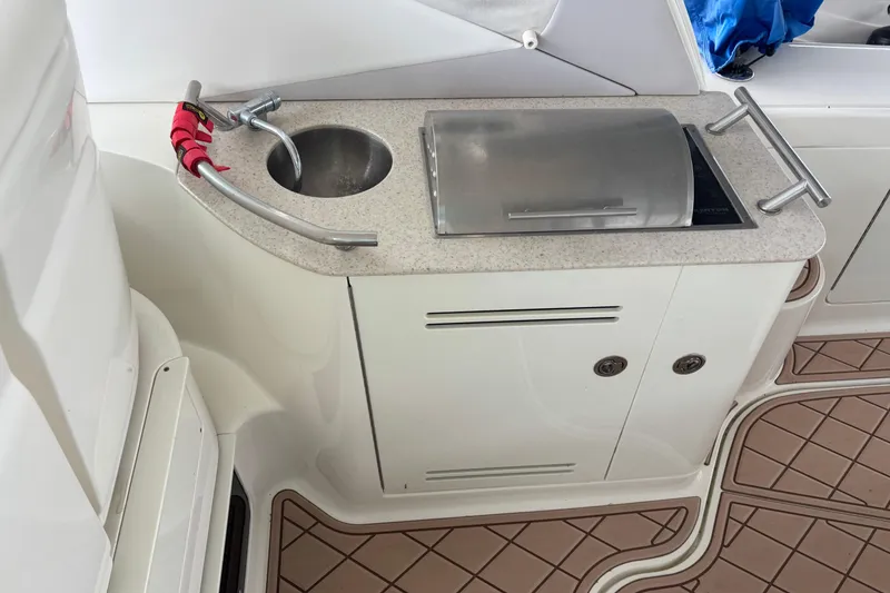 Slide: The Image of Compact kitchenette on 2010 Sea Ray Sundancer 370 yacht with sink and grill. - 21