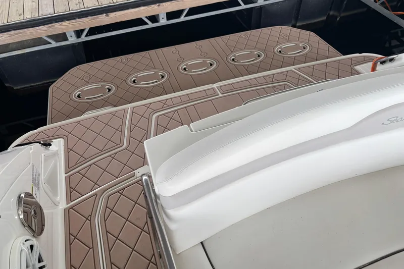 Slide: The Image of 2010 Sea Ray Sundancer 370 swim platform with textured brown decking. - 22