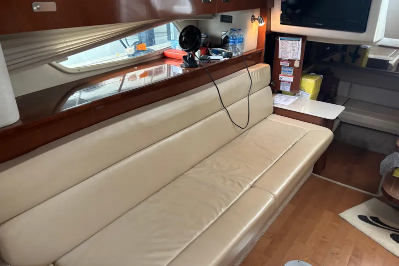 Slide: The Image of Luxurious interior of 2010 Sea Ray Sundancer 370 yacht with beige leather seating. - 24