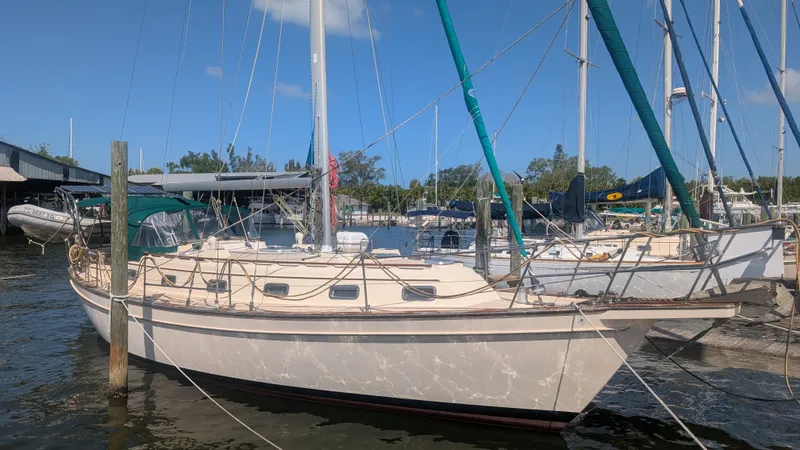 The Image of 1998 Island Packet 40 sailboat docked at marina. - 0