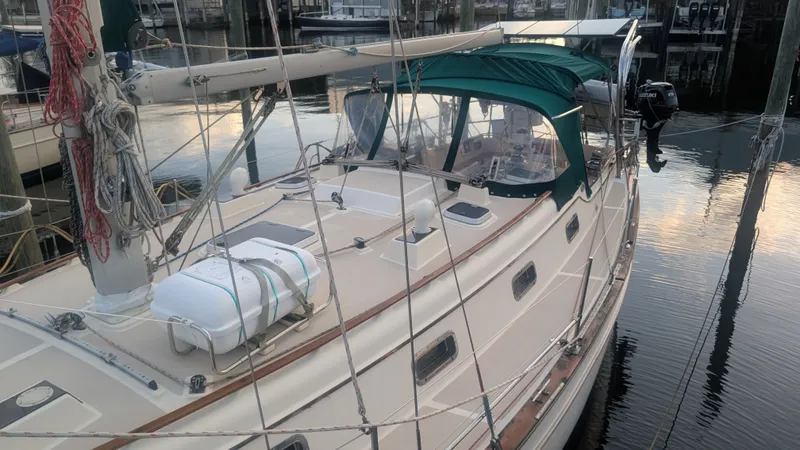 Slide: The Image of 1998 Island Packet 40 sailboat docked in harbor. - 2