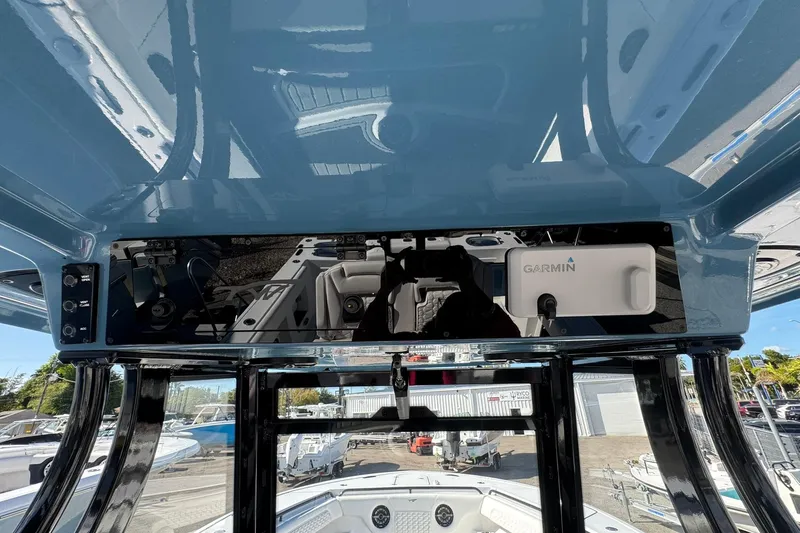 Slide: The Image of 2026 Tidewater 302 CC Adventure boat console with Garmin electronics. - 29