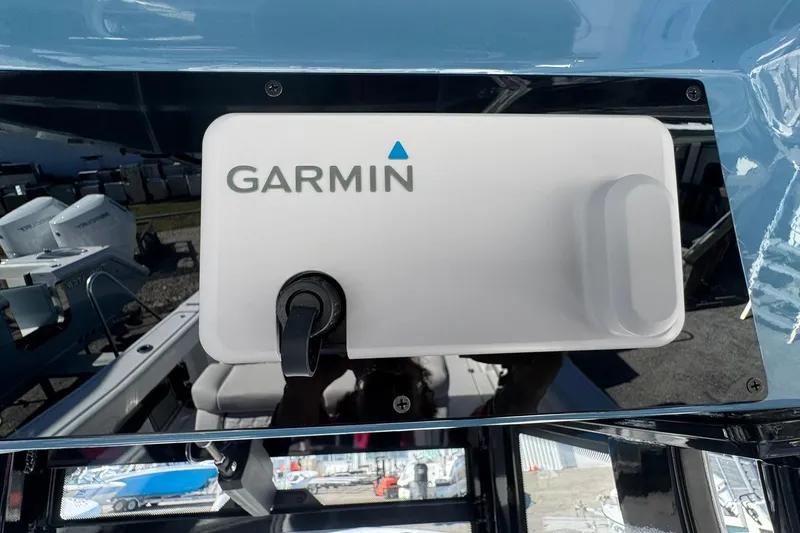Slide: The Image of Garmin device on 2026 Tidewater 302 CC Adventure boat dashboard. - 30