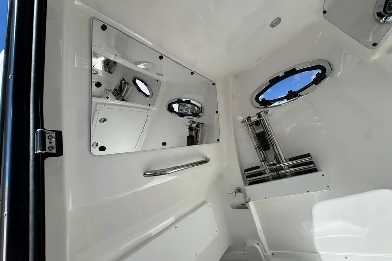 Slide: The Image of Interior of 2026 Tidewater 302 CC Adventure boat with sleek design and modern fixtures. - 37