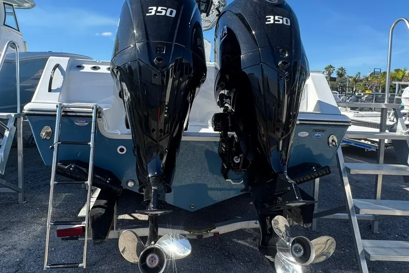 Slide: The Image of 2026 Tidewater 302 CC Adventure boat with dual 350 horsepower engines. - 4