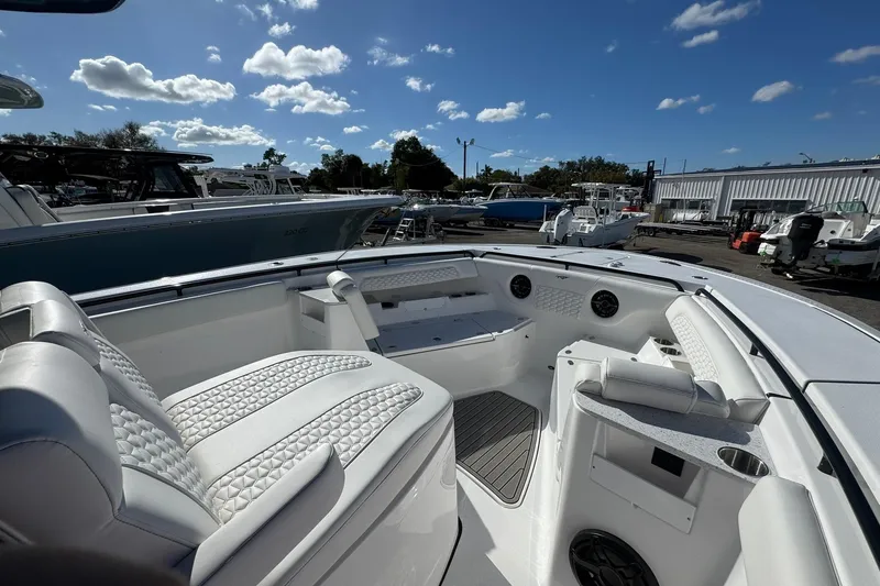 Slide: The Image of 2026 Tidewater 302 CC Adventure boat interior with luxurious seating and modern design. - 40
