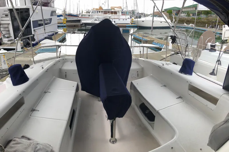 Slide: The Image of Cockpit of a 1998 Catalina 380 sailboat docked at a marina. - 19