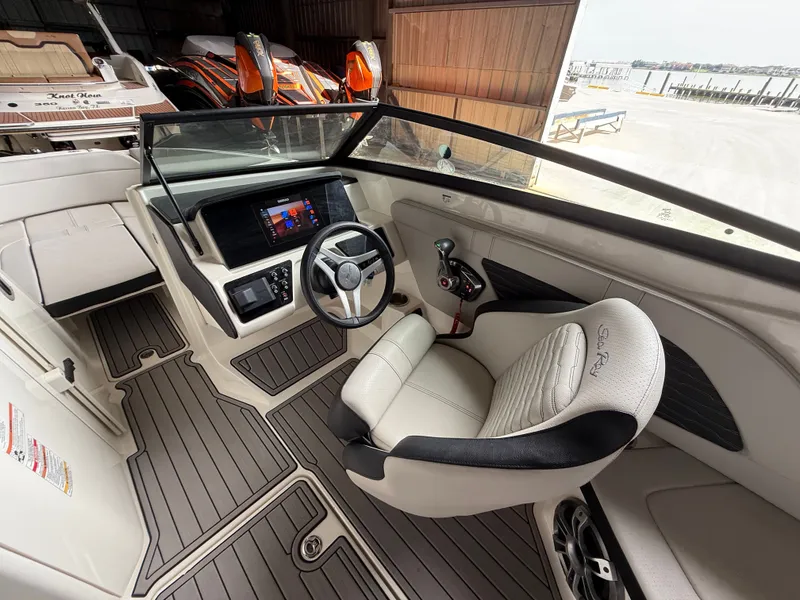 Slide: The Image of Interior of a 2023 Sea Ray 23 SPX OB boat with modern cockpit. - 16