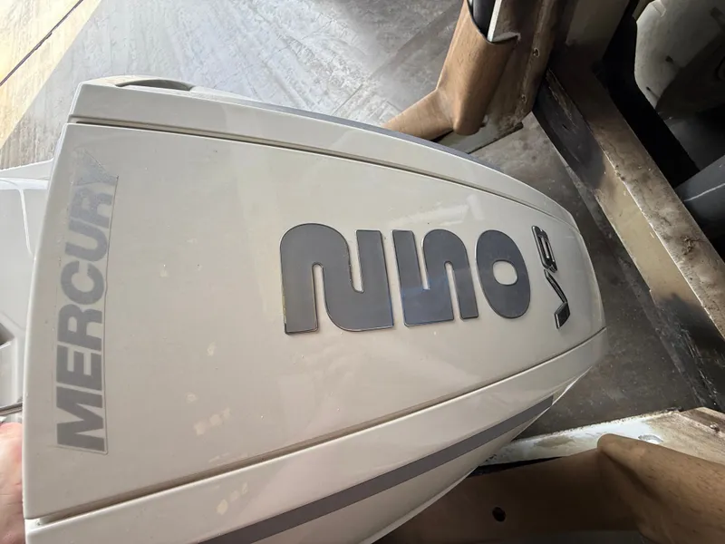 Slide: The Image of Mercury outboard motor on a 2023 Sea Ray 23 SPX OB boat. - 22