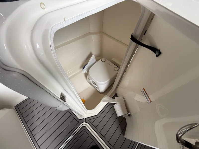 Slide: The Image of Interior of Sea Ray 23 SPX OB with toilet, 2023 model. - 8