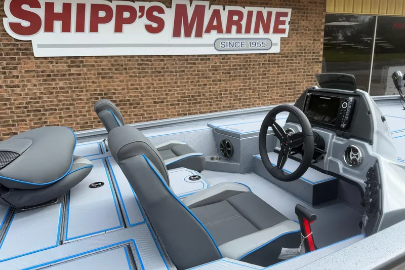 Slide: The Image of 2026 Xpress H20 boat interior with steering wheel and navigation system at Shipp's Marine. - 3