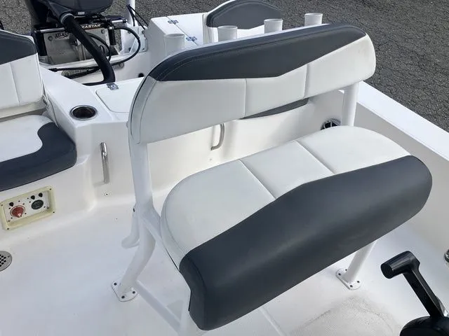 Slide: The Image of Interior of 2020 Robalo 206 Cayman with gray and white seating. - 20