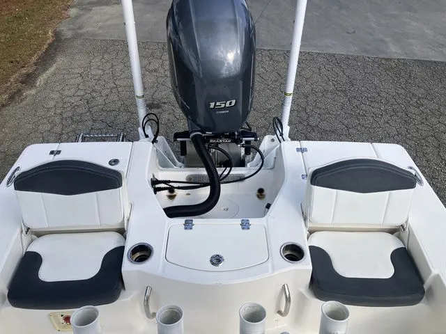 Slide: The Image of 2020 Robalo 206 Cayman with 150 HP outboard motor. - 22