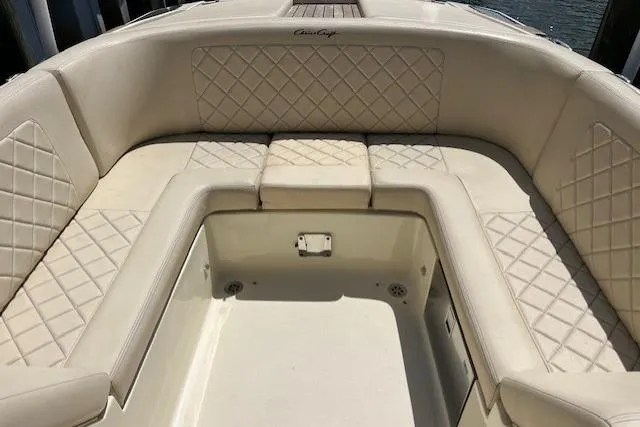 Slide: The Image of 2019 Chris-Craft Launch 27 boat interior with steering wheel and dashboard. - 12