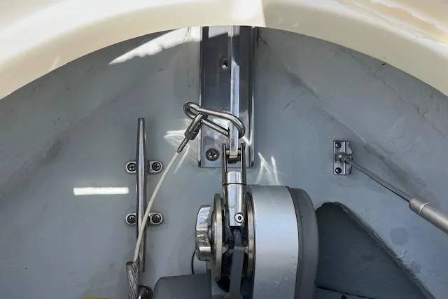 Slide: The Image of 2019 Chris-Craft Launch 27 cockpit with luxurious beige seating and wooden steering wheel. - 15