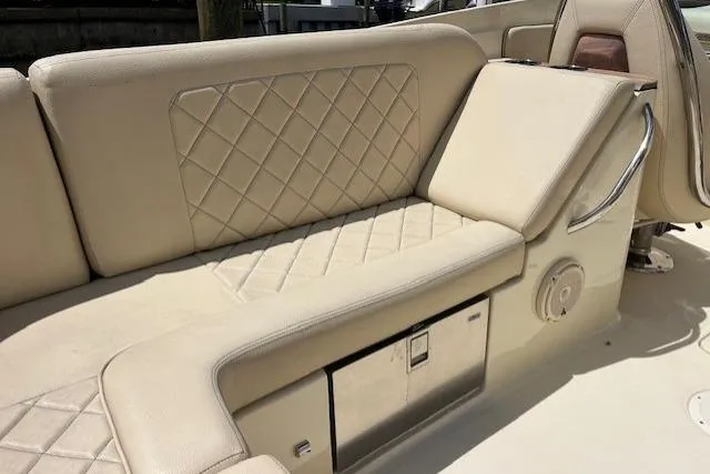 Slide: The Image of 2019 Chris-Craft Launch 27 boat interior with steering wheel and dashboard view. - 16
