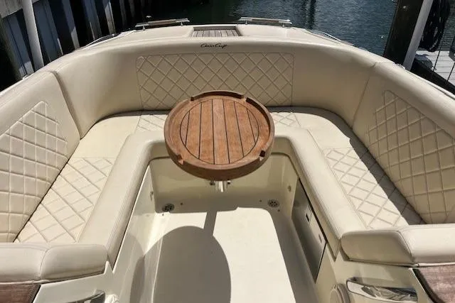 Slide: The Image of Interior detail of 2019 Chris-Craft Launch 27 boat, featuring a sleek white finish. - 20
