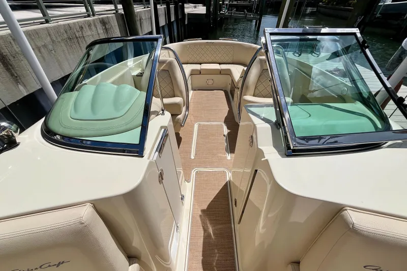 Slide: The Image of 2019 Chris-Craft Launch 27 boat interior with elegant seating and open deck design. - 27