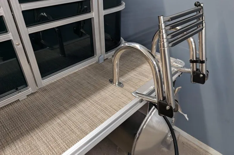 Slide: The Image of 2026 Sylvan Mirage Fish 818 Fish boat deck with stainless steel ladder. - 2