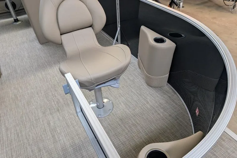 Slide: The Image of Interior of 2026 Sylvan Mirage Fish 818 Fish boat with beige seating and cup holders. - 3