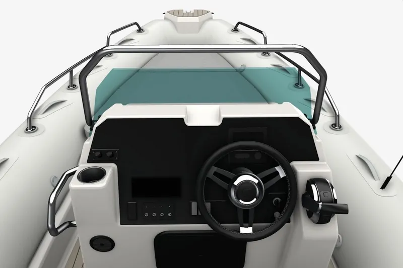 Slide: The Image of 2026 Zodiac Medline 7.5 boat cockpit with steering wheel and control panel. - 12
