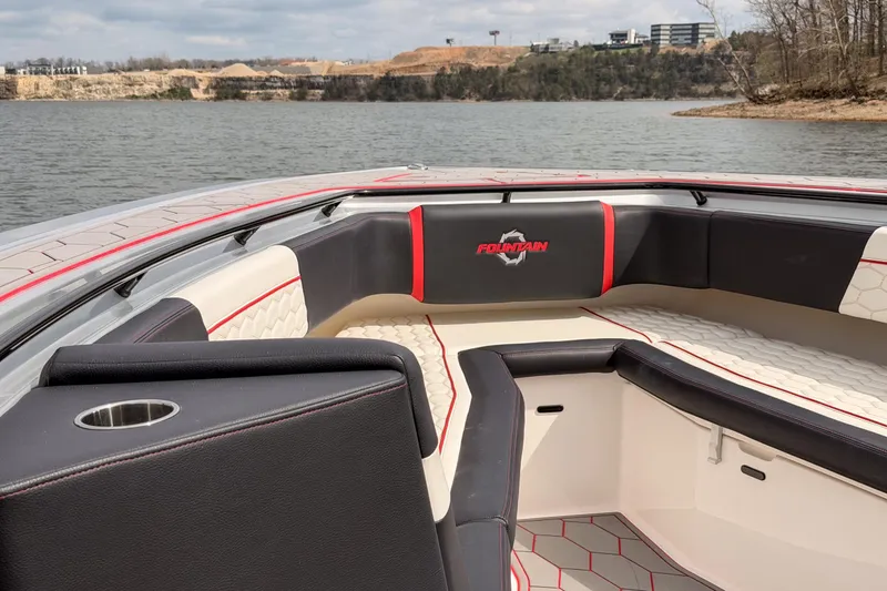 Slide: The Image of 2021 Fountain 38 SC boat interior with stylish seating and scenic lake view. - 15