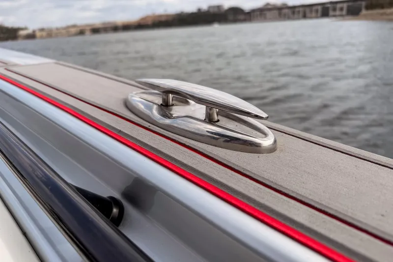 Slide: The Image of 2021 Fountain 38 SC boat cleat on deck by the water. - 24