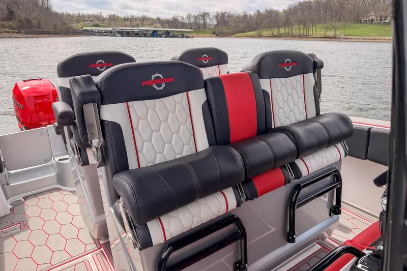 Slide: The Image of 2021 Fountain 38 SC boat interior with stylish black and red seating. - 26