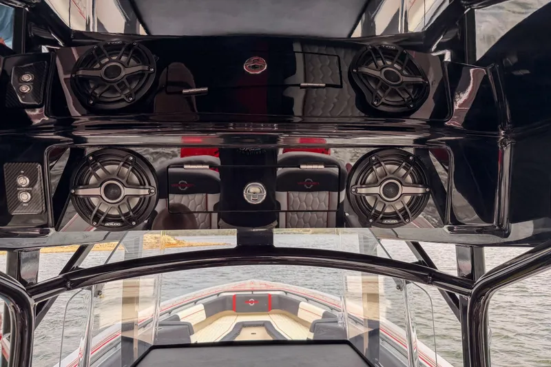 Slide: The Image of 2021 Fountain 38 SC boat interior with sleek audio system and modern design. - 44