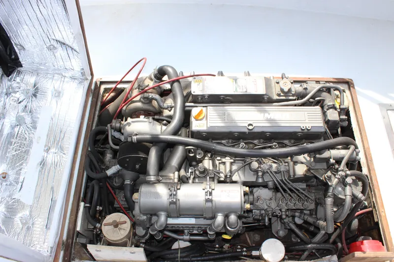 Slide: The Image of Engine compartment of a 1979 Tripp Angler 22 Flush Deck Cuddy boat. - 21