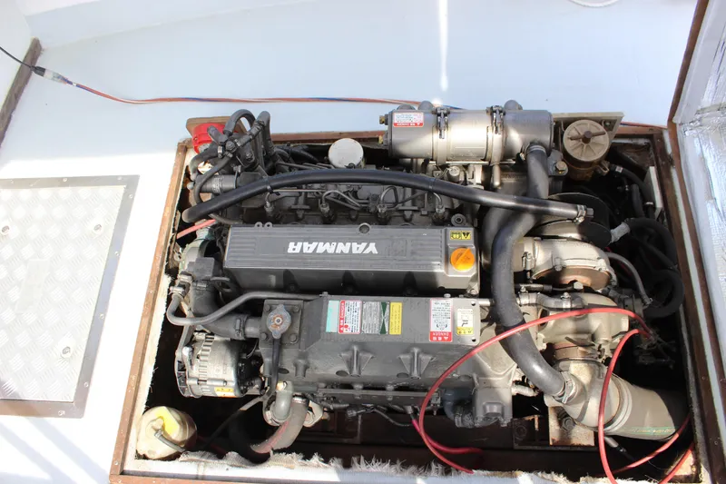 Slide: The Image of Engine compartment of a 1979 Tripp Angler 22 Flush Deck Cuddy boat. - 25