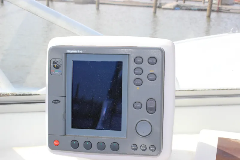 Slide: The Image of Raymarine L760 marine display on 1979 Tripp Angler 22 Flush Deck Cuddy boat. - 32
