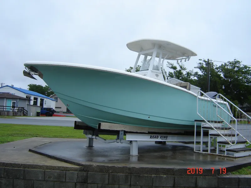 The Image of 2018 Tidewater 232 LXF boat on trailer, side view. - 0