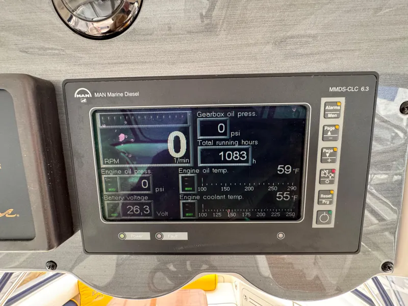 Slide: The Image of 2007 Sea Ray 58 Sedan Bridge engine display showing 1083 running hours and various metrics. - 26