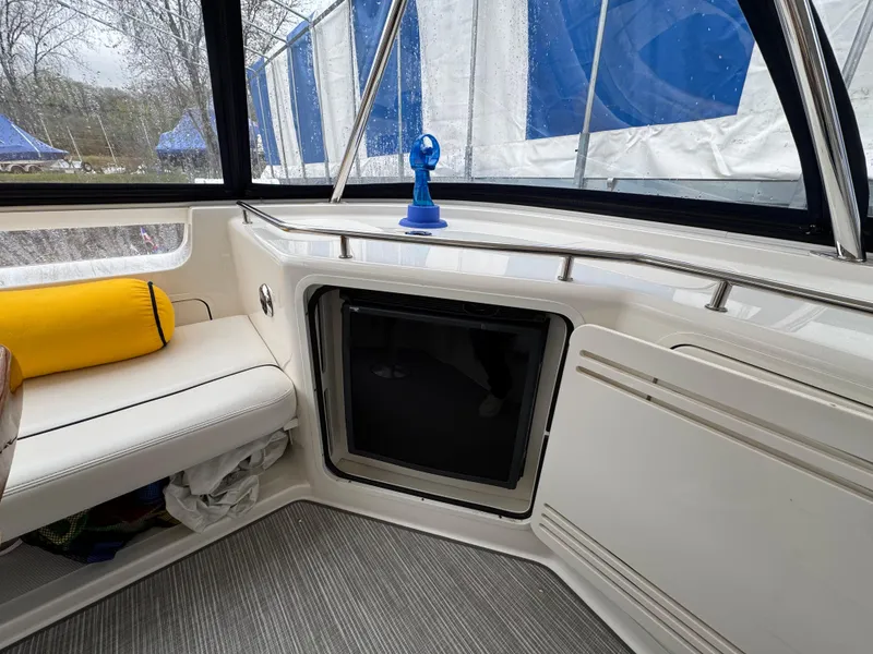 Slide: The Image of Interior of 2007 Sea Ray 58 Sedan Bridge with seating and storage. - 31