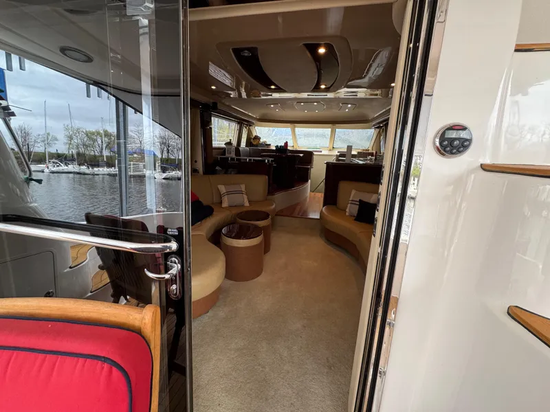 Slide: The Image of Interior view of 2007 Sea Ray 58 Sedan Bridge yacht, featuring luxurious seating and elegant design. - 35