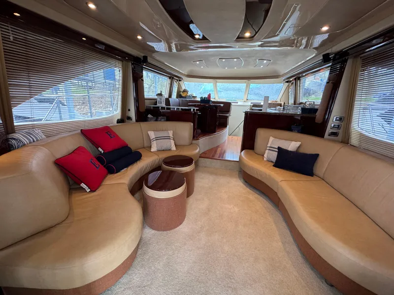 Slide: The Image of Luxurious interior of a 2007 Sea Ray 58 Sedan Bridge yacht with elegant seating and decor. - 36