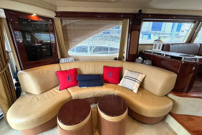Slide: The Image of Luxurious interior of 2007 Sea Ray 58 Sedan Bridge yacht with plush seating and elegant decor. - 37