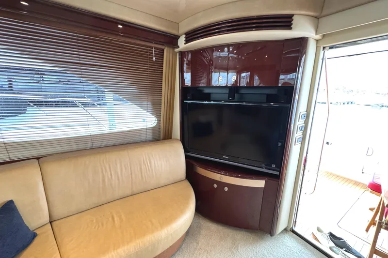 Slide: The Image of Interior of 2007 Sea Ray 58 Sedan Bridge yacht with TV and leather seating. - 39