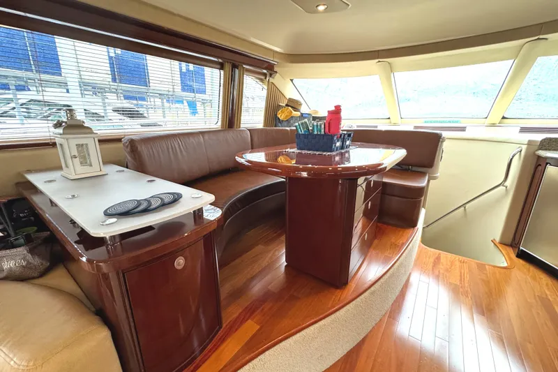 Slide: The Image of Luxurious interior of 2007 Sea Ray 58 Sedan Bridge yacht with elegant wood finishes. - 42