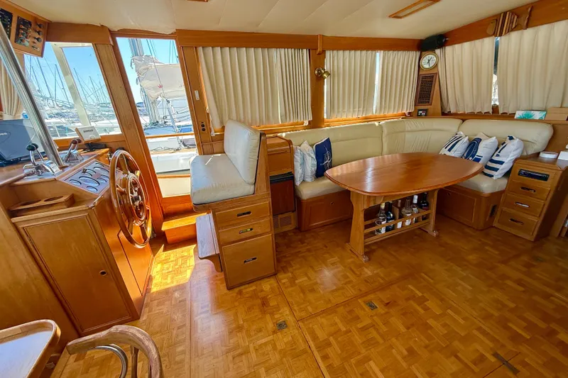 Slide: The Image of Interior of 1992 Grand Banks 46 Classic yacht with wooden furnishings and nautical decor. - 14