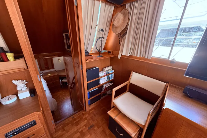 Slide: The Image of Interior of 1992 Grand Banks 46 Classic yacht with wooden furnishings and cozy seating. - 17