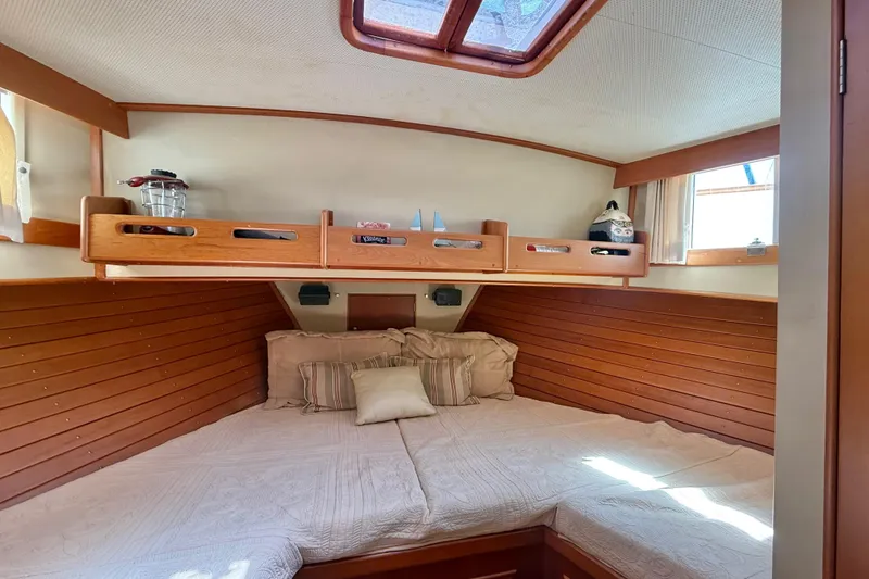 Slide: The Image of Cozy cabin interior of 1992 Grand Banks 46 Classic yacht with wooden accents. - 31