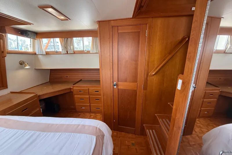 Slide: The Image of Luxurious wooden interior of 1992 Grand Banks 46 Classic yacht cabin. - 44
