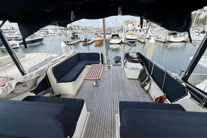 Slide: The Image of Spacious deck of 1992 Grand Banks 46 Classic yacht in marina setting. - 69
