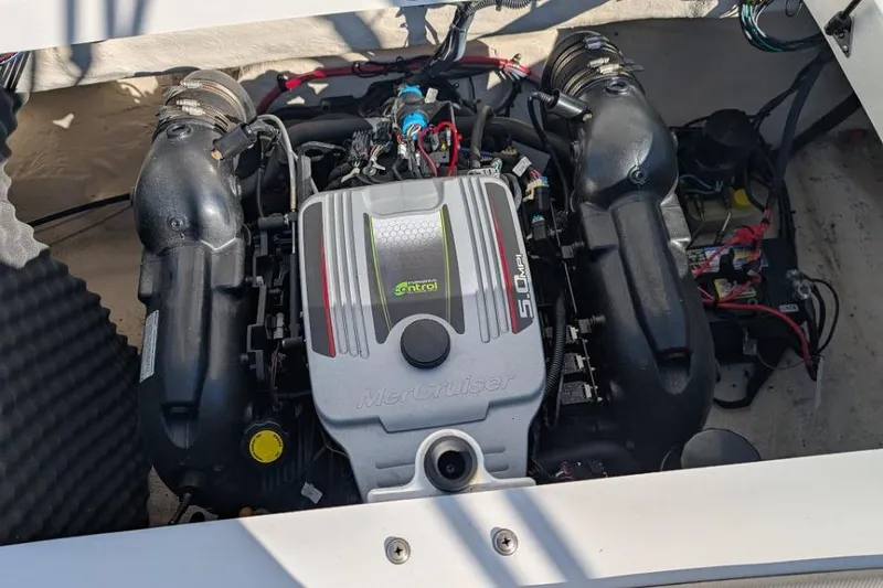 Slide: The Image of Engine compartment of a 2012 Rinker 216 Captiva Bowrider with MerCruiser engine. - 11